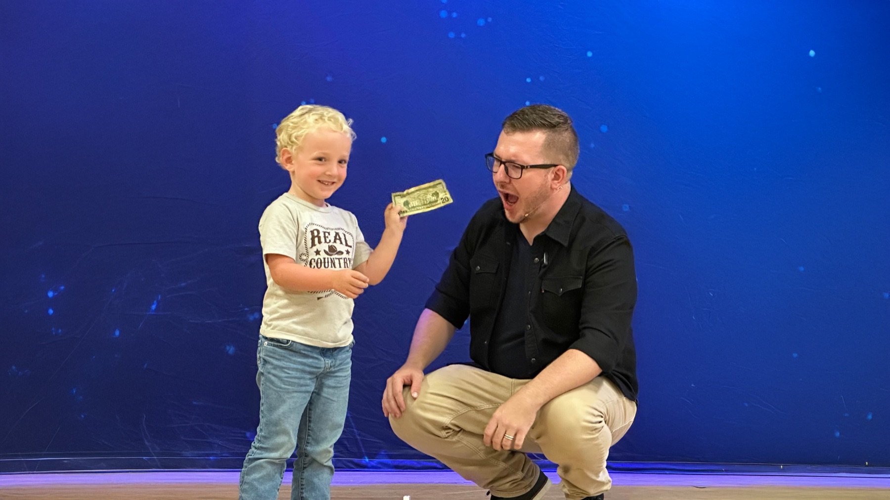 A young volunteer on stage steals the show