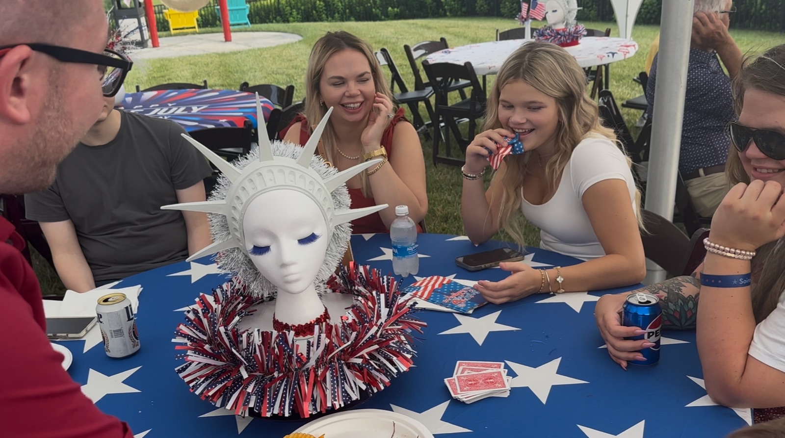 An outdoor celebration gathered around the magic