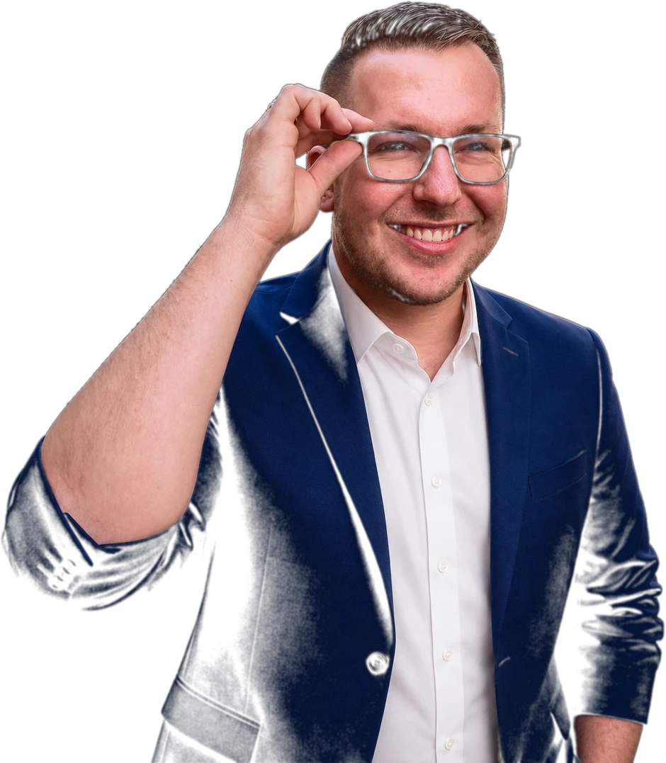 Tyler Reed in a royal blue blazer, adjusting his glasses with a grin, ready for showtime